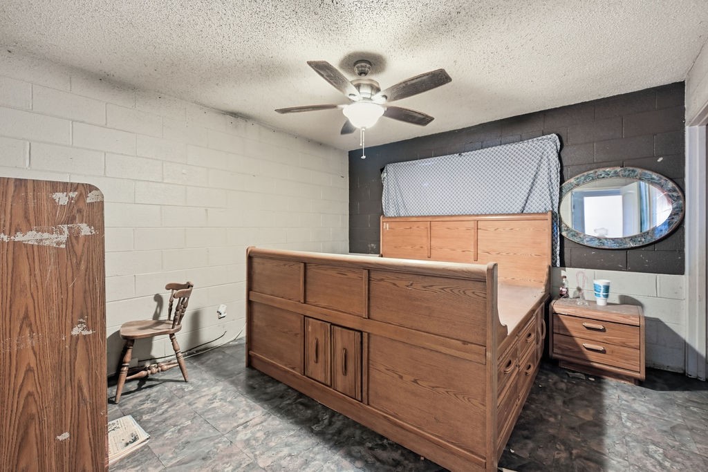 508 South Kenneth Avenue Monahans, TX 79756 - Photo 17 of 39 a room with a baby bed and a dresser
