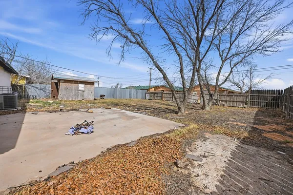 a house with yard in front of it