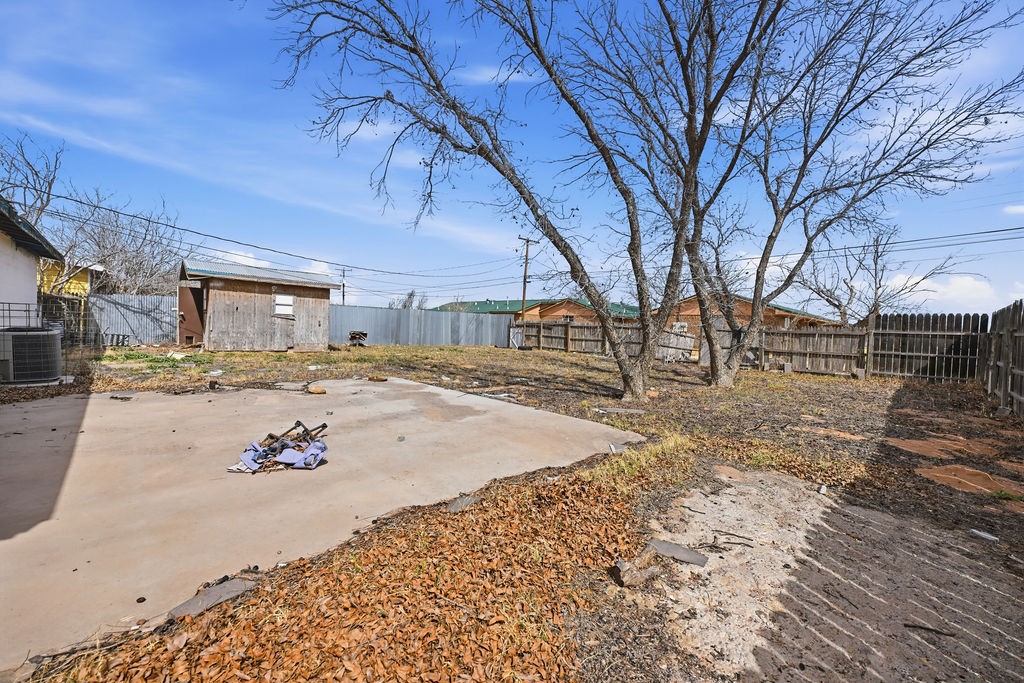 508 South Kenneth Avenue Monahans, TX 79756 - Photo 34 of 39 a view of road with card and refrigerator