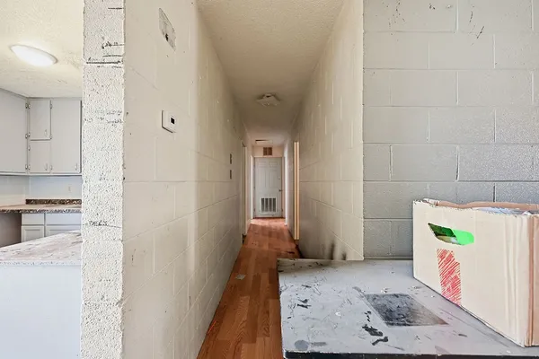 a view of an empty room with a window