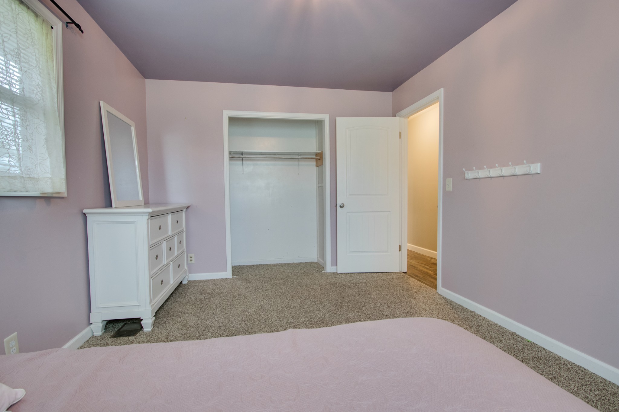 445 Tracy Road Watertown, TN 37184 - Photo 24 of 49 a view of a hallway with wooden floor and cabinets