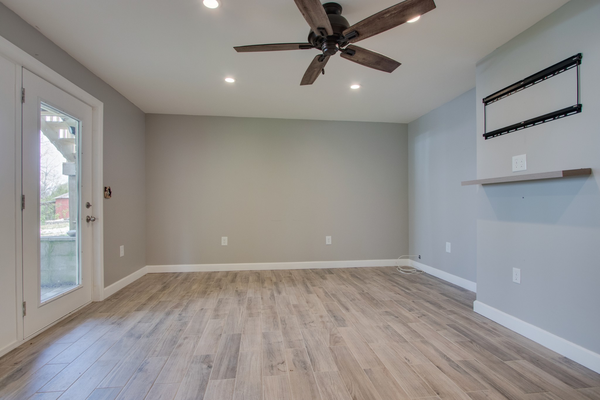 445 Tracy Road Watertown, TN 37184 - Photo 33 of 49 wooden floor in an empty room with a window