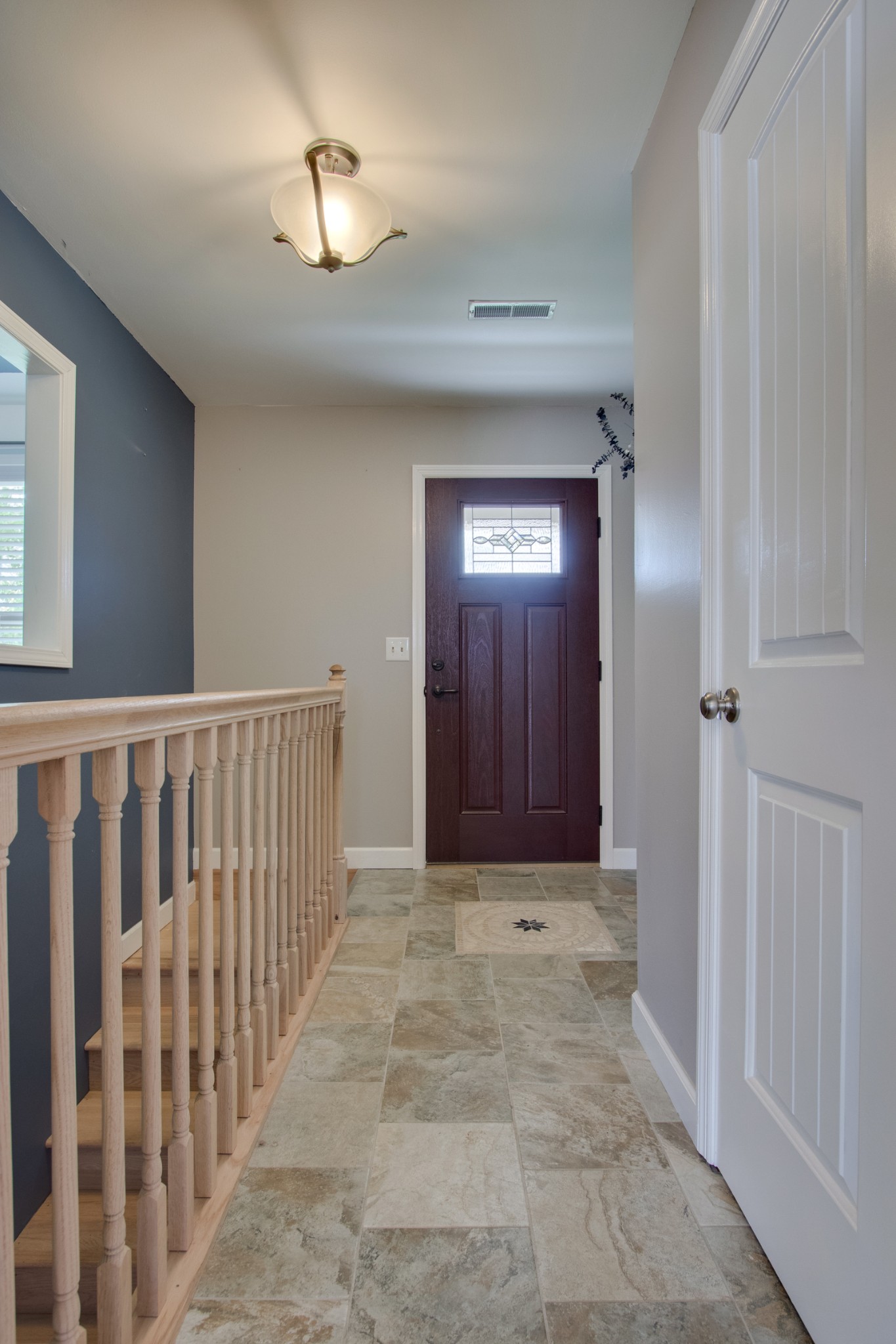 445 Tracy Road Watertown, TN 37184 - Photo 7 of 49 a view of a hallway with wooden shelves