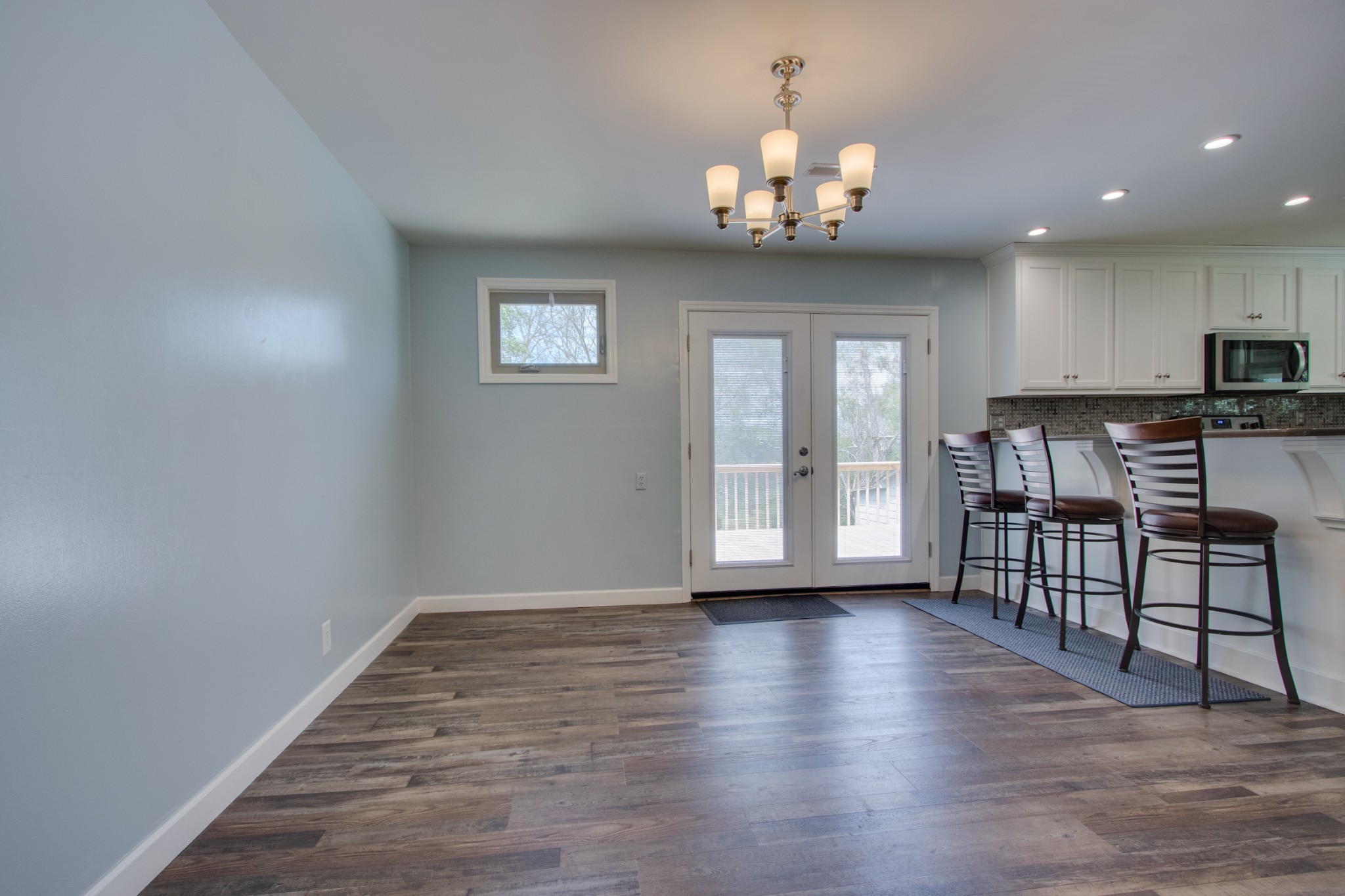 445 Tracy Road Watertown, TN 37184 - Photo 8 of 49 a view of a livingroom with furniture wooden floor chandelier