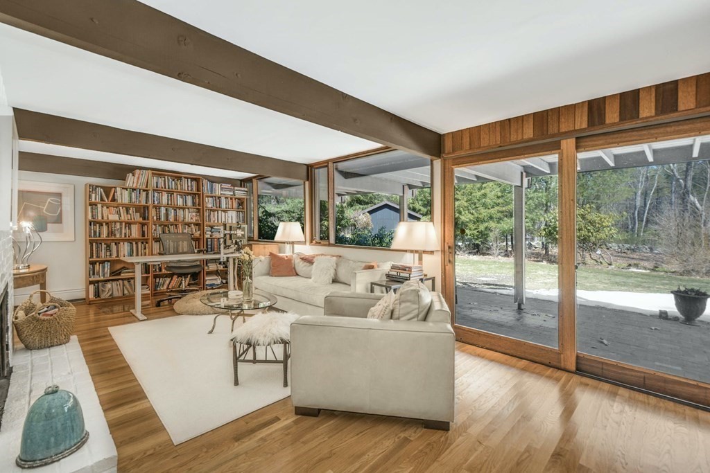 246 Heald Road Carlisle, MA 01741 - Photo 15 of 25 a living room with furniture and a large window