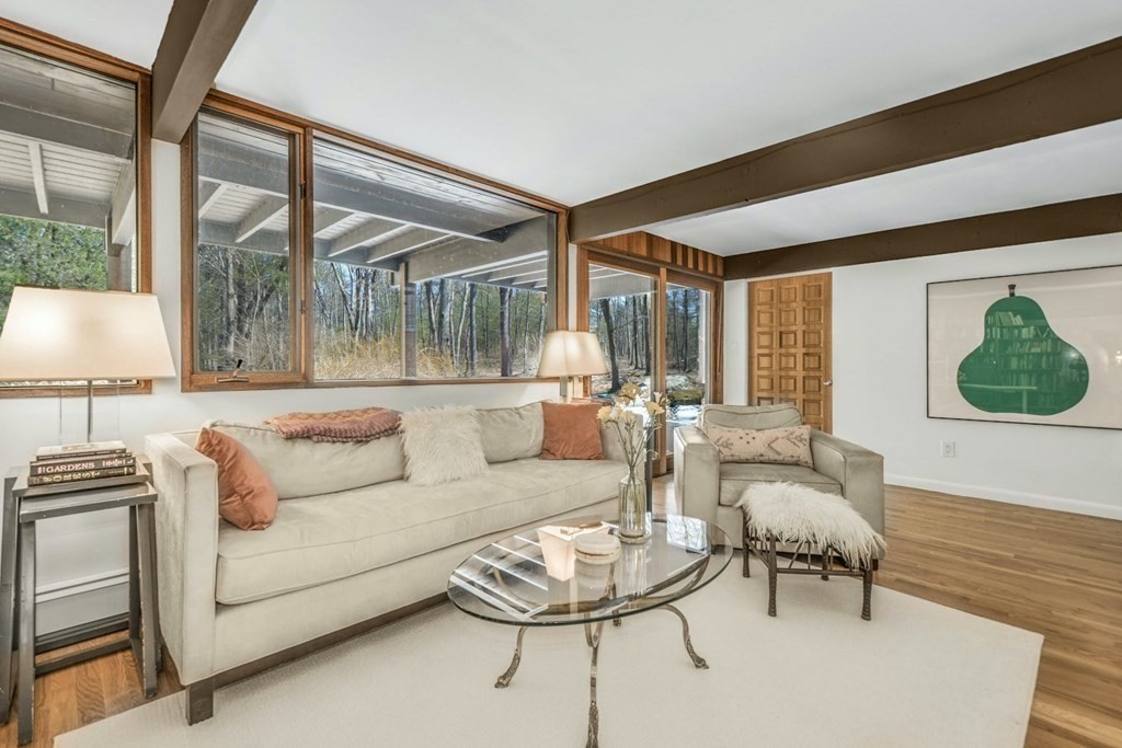 246 Heald Road Carlisle, MA 01741 - Photo 16 of 25 a living room with furniture and a large window