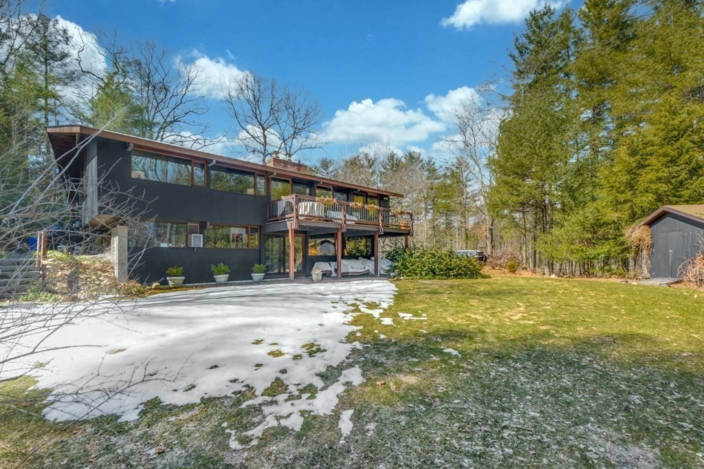 246 Heald Road Carlisle, MA 01741 - Photo 23 of 25 a view of a house with a yard