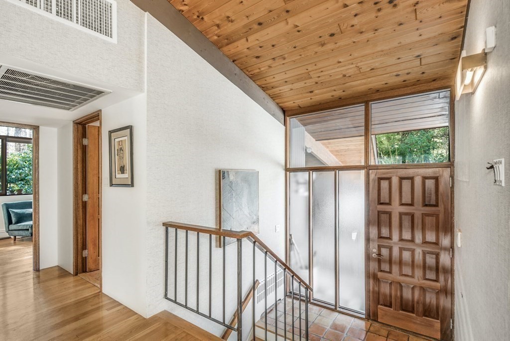 246 Heald Road Carlisle, MA 01741 - Photo 3 of 25 a view of staircase with large window