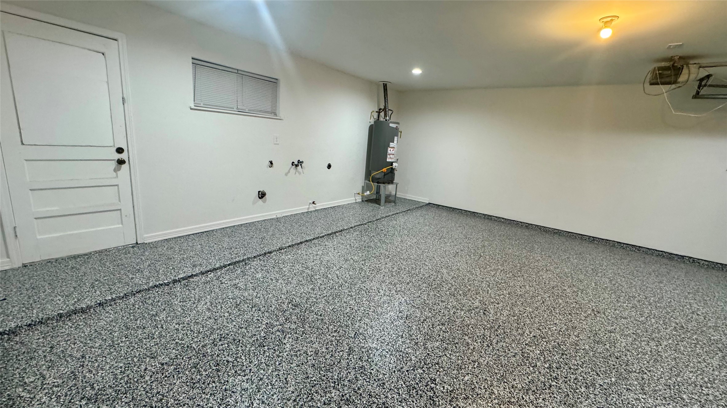 202 Massey Tompkins Road Baytown, TX 77521 - Photo 13 of 20 an empty room with a bench