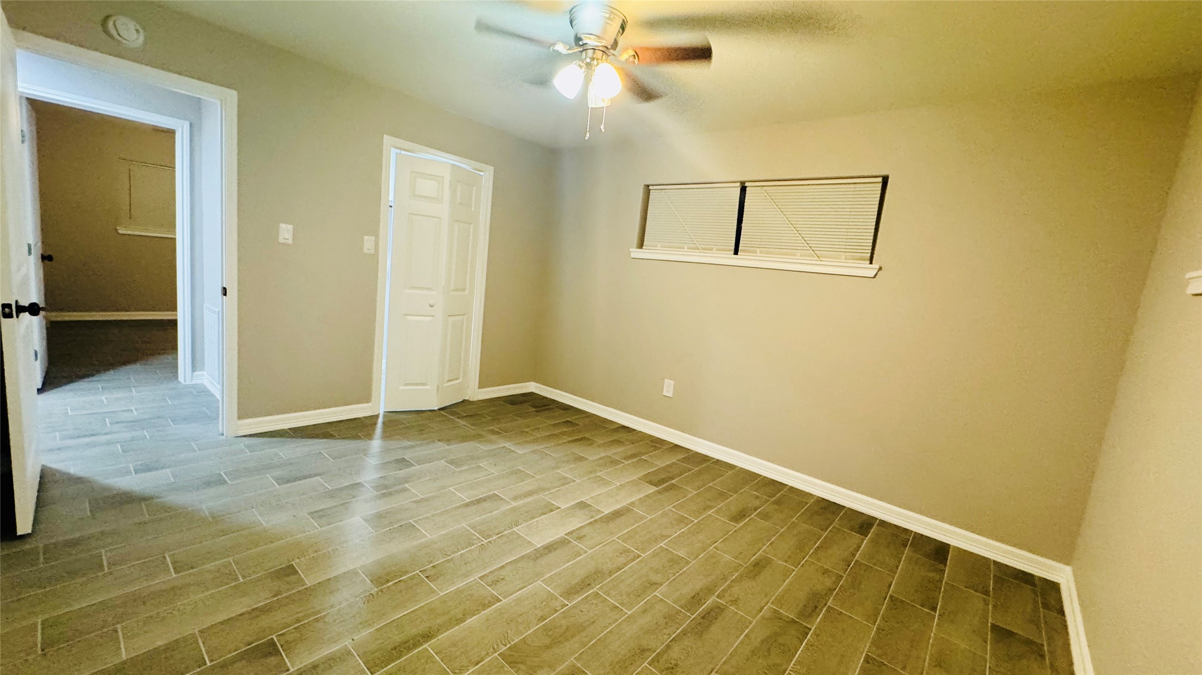 202 Massey Tompkins Road Baytown, TX 77521 - Photo 6 of 20 a view of empty room with wooden floor