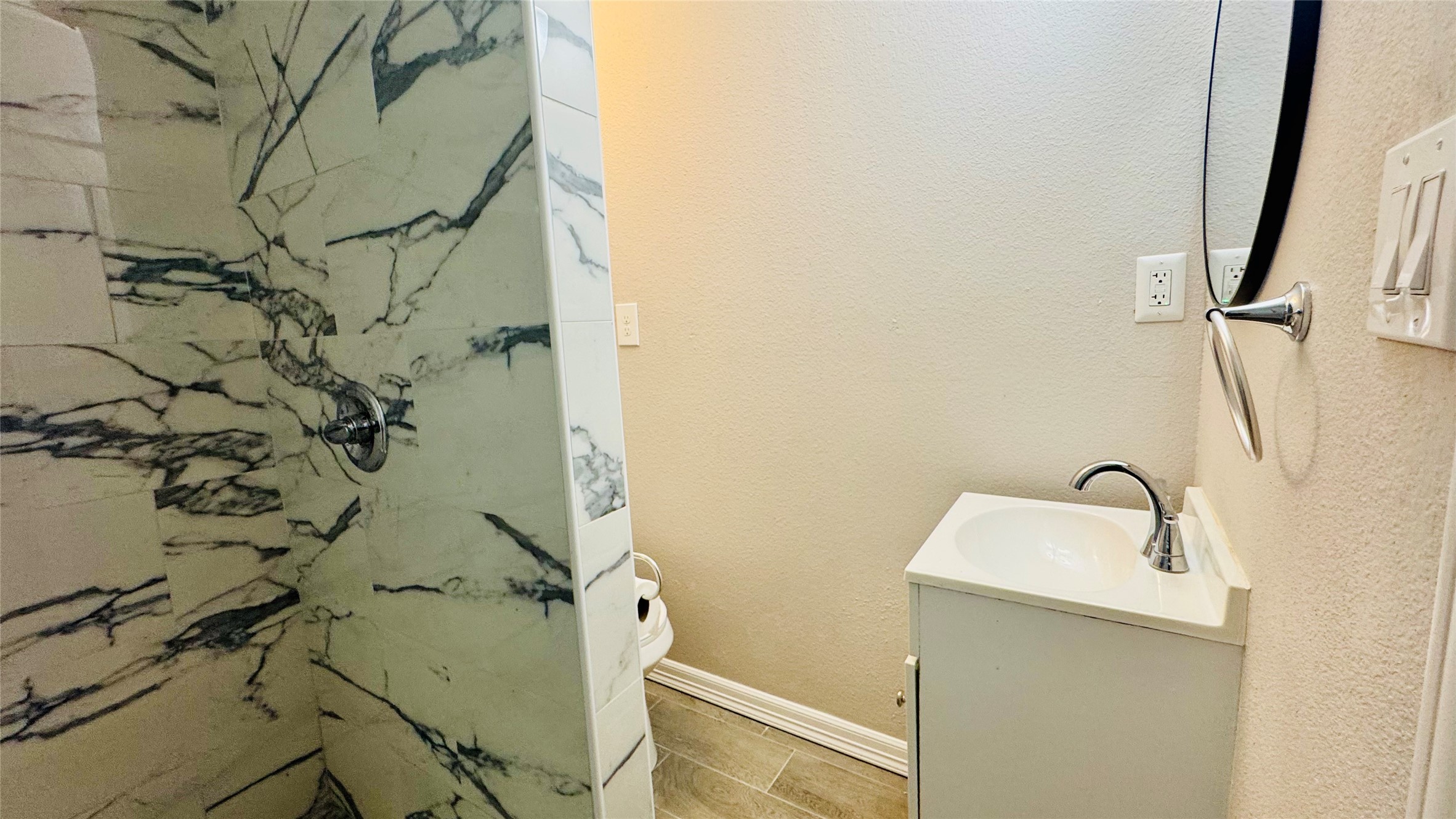 202 Massey Tompkins Road Baytown, TX 77521 - Photo 8 of 20 a bathroom with a sink and mirror