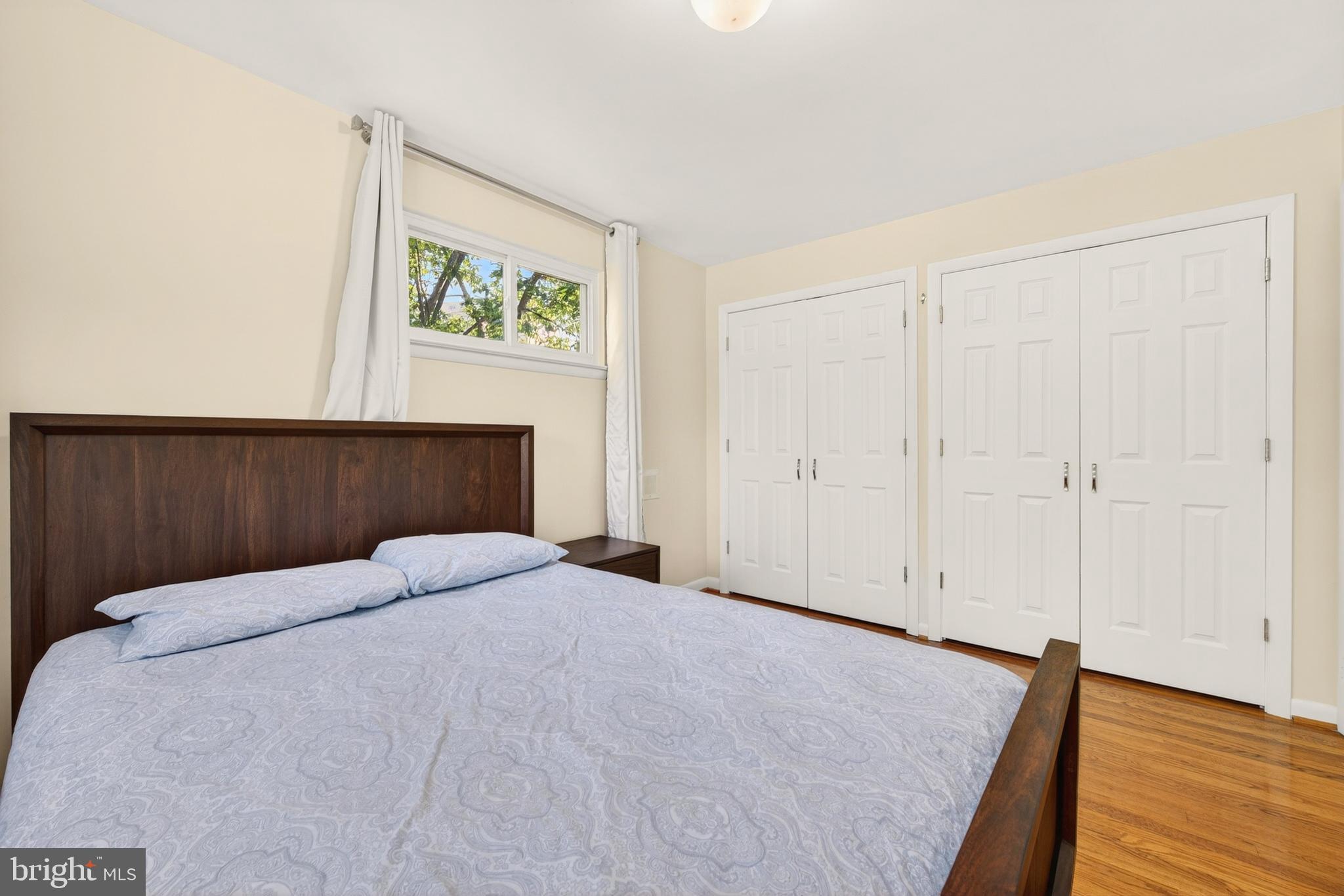 914 Kenbrook Court Silver Spring, MD 20902 - Photo 23 of 35 a bedroom with a bed and a window