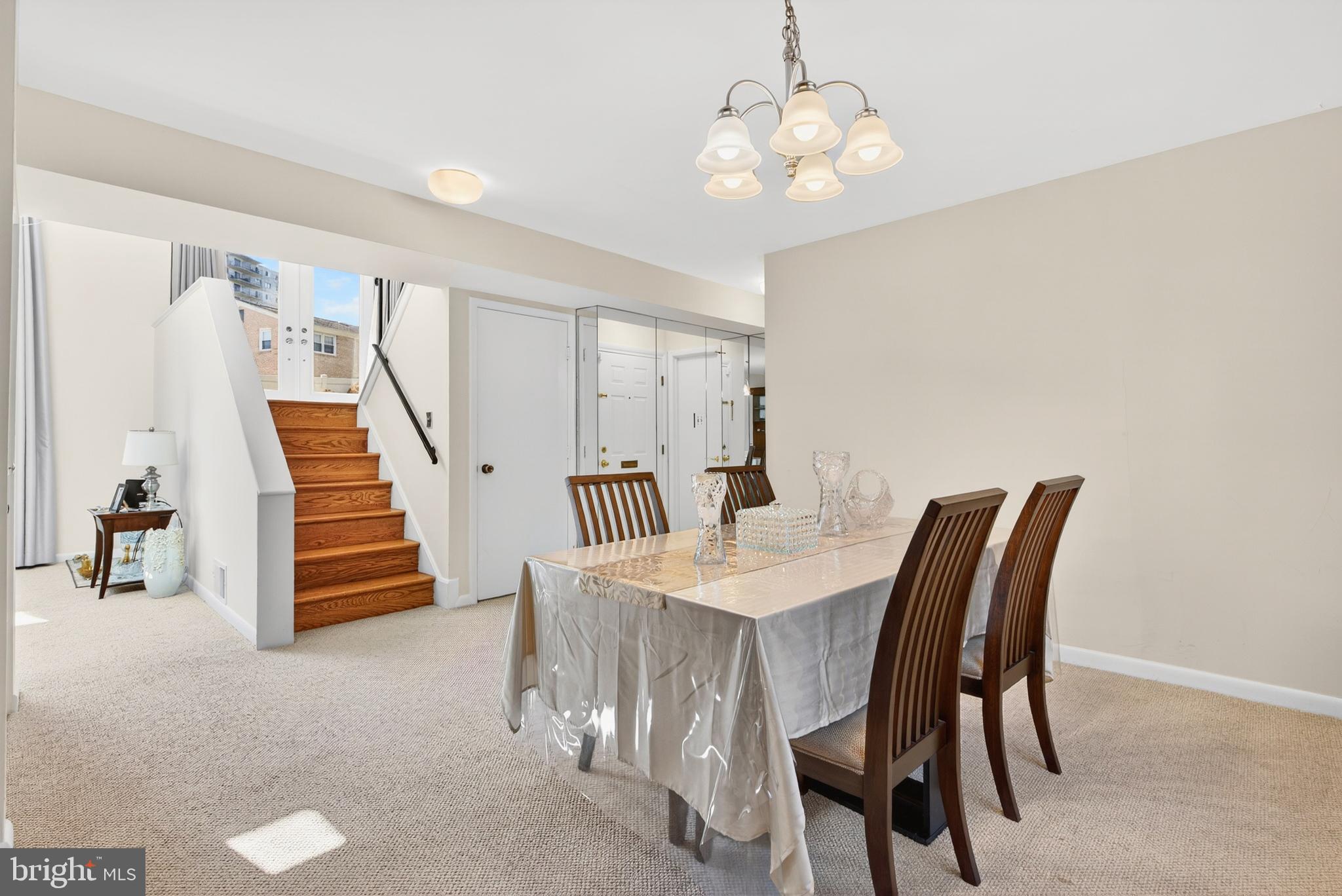 914 Kenbrook Court Silver Spring, MD 20902 - Photo 5 of 35 a view of a dining room with furniture and wooden floor