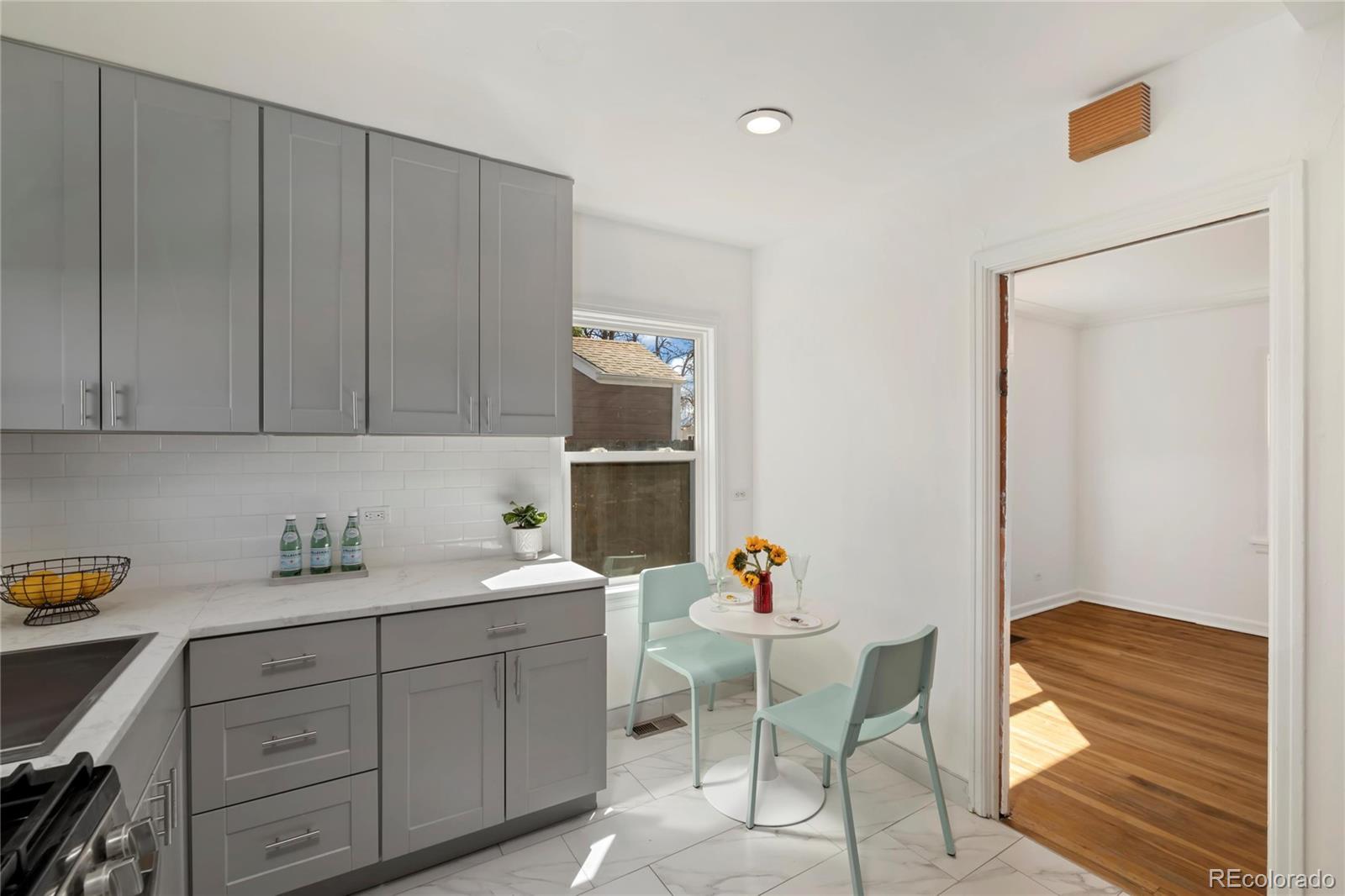 2570 Jay Street Edgewater, CO 80214 - Photo 9 of 26 a kitchen with a sink and cabinets