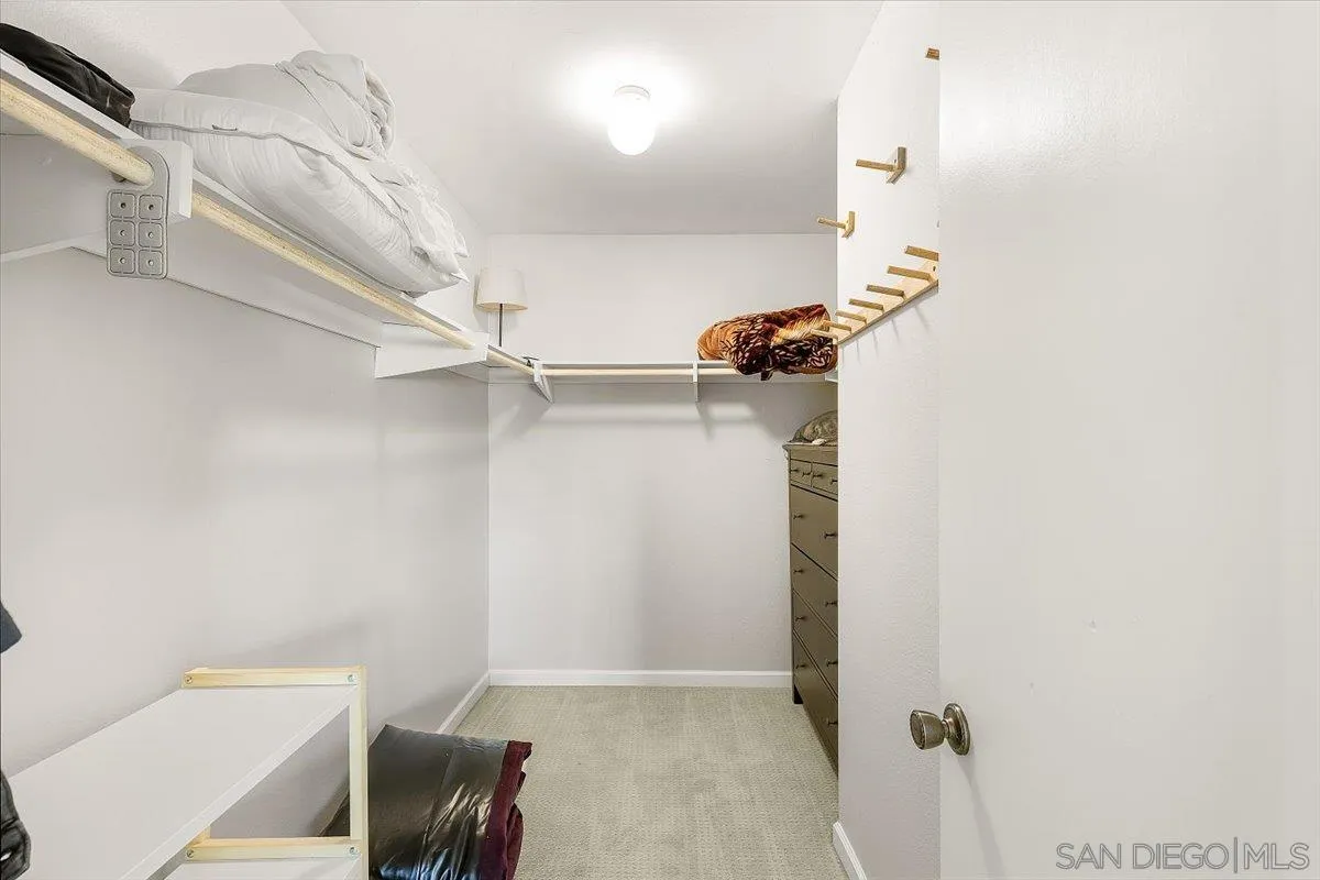 8335 Carlton Oaks Drive Santee, CA 92071 - Photo 22 of 32 a view of a room with table and chairs