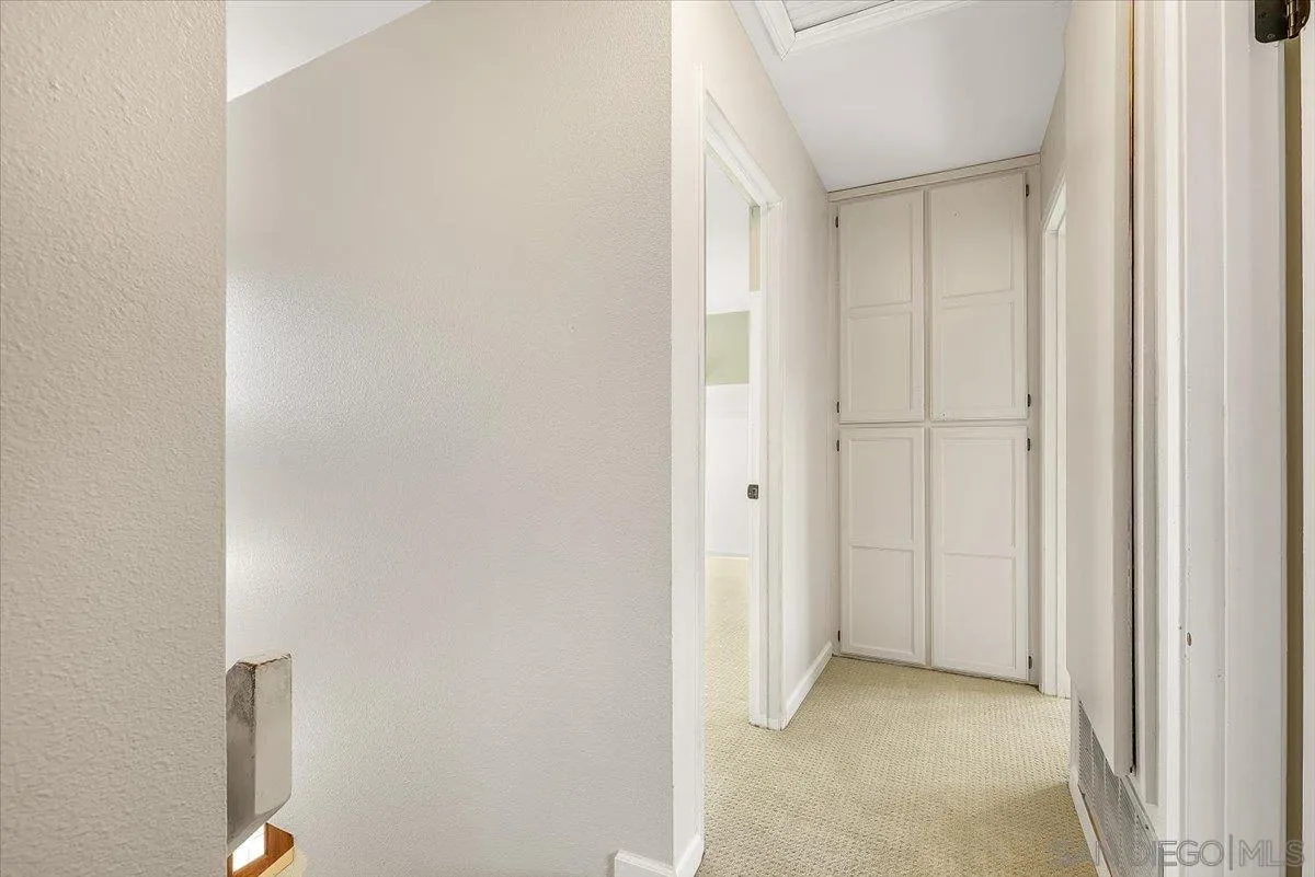 8335 Carlton Oaks Drive Santee, CA 92071 - Photo 27 of 32 a view of a room with door