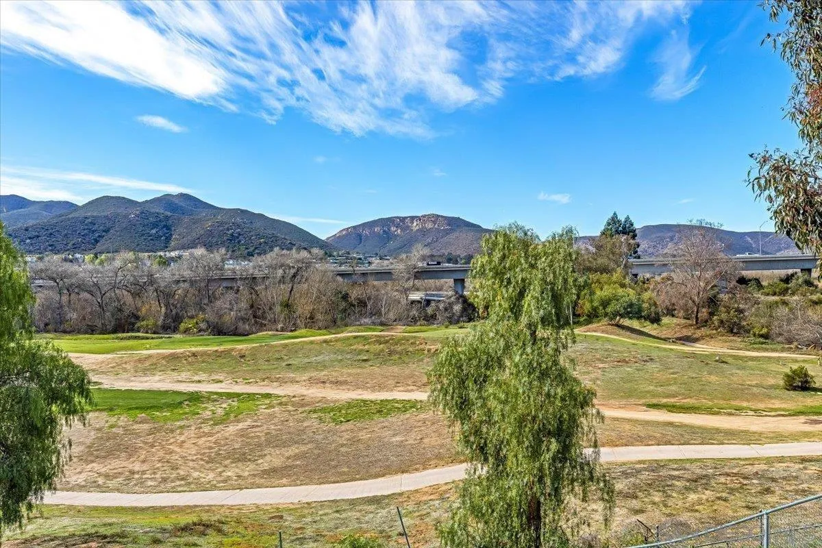 8335 Carlton Oaks Drive Santee, CA 92071 - Photo 29 of 32 a view of a town with mountains in the background