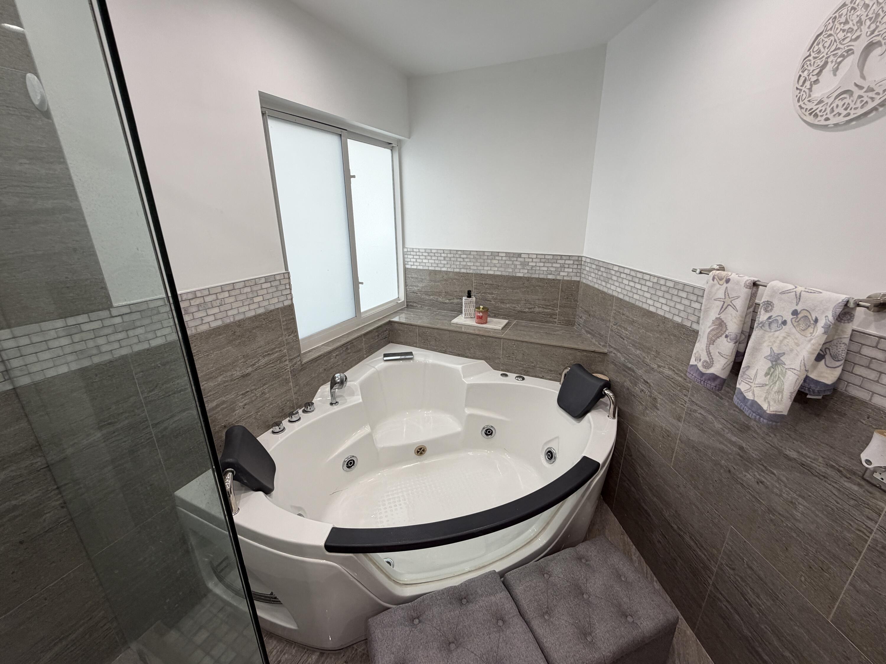 8097 Cedar Hollow Lane Boca Raton, FL 33433 - Photo 15 of 36 a bathroom with a sink and a mirror