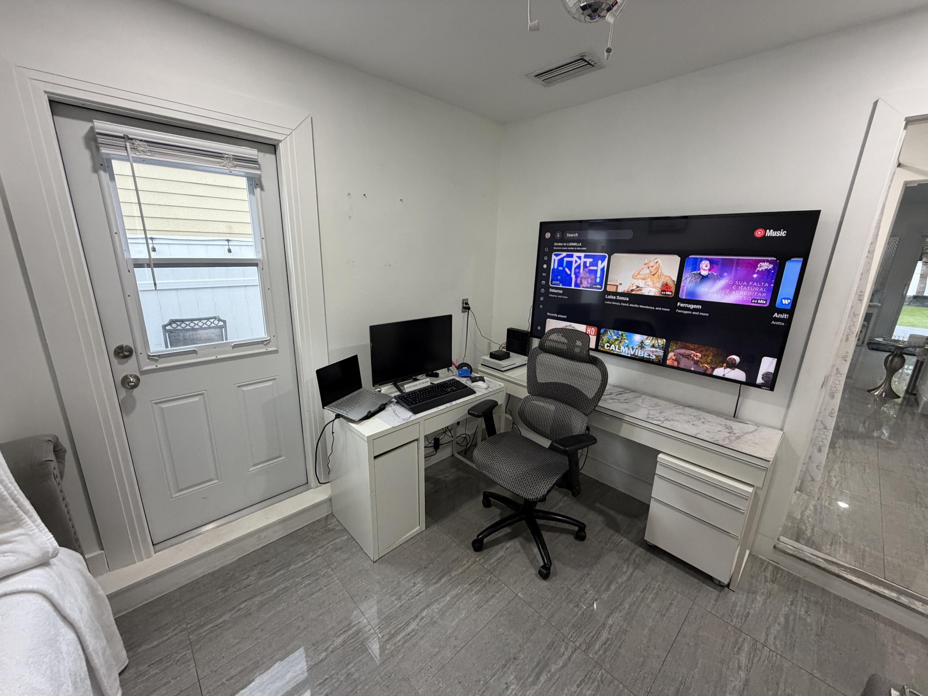8097 Cedar Hollow Lane Boca Raton, FL 33433 - Photo 21 of 36 a living room with furniture and a flat screen tv