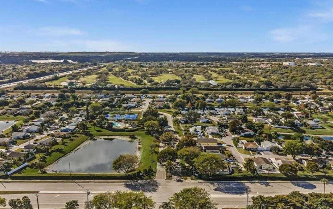 8097 Cedar Hollow Lane Boca Raton, FL 33433 - Photo 31 of 36 an aerial view of residential building and ocean