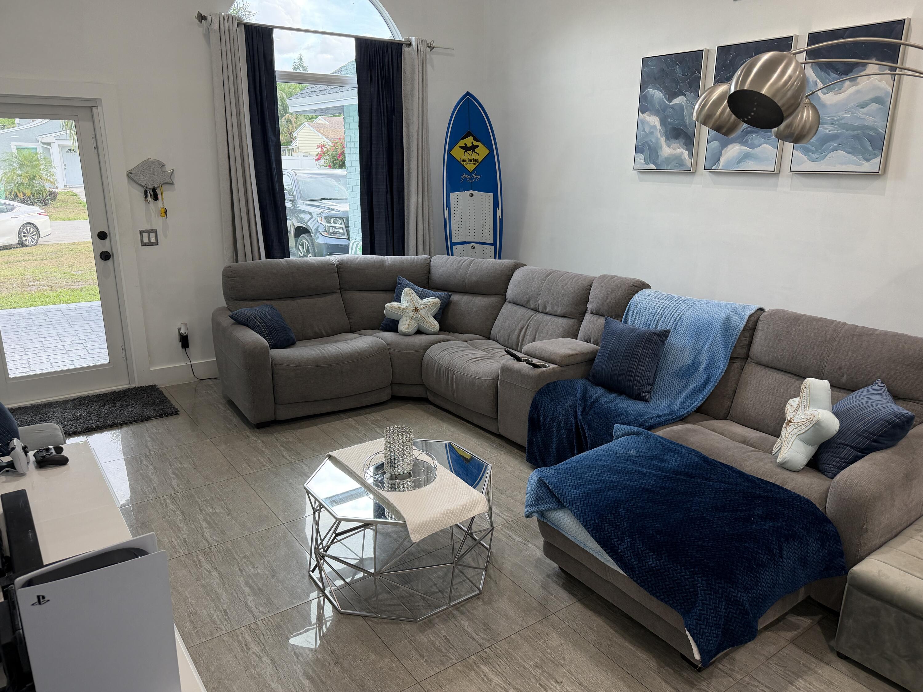 8097 Cedar Hollow Lane Boca Raton, FL 33433 - Photo 7 of 36 a living room with furniture and a window