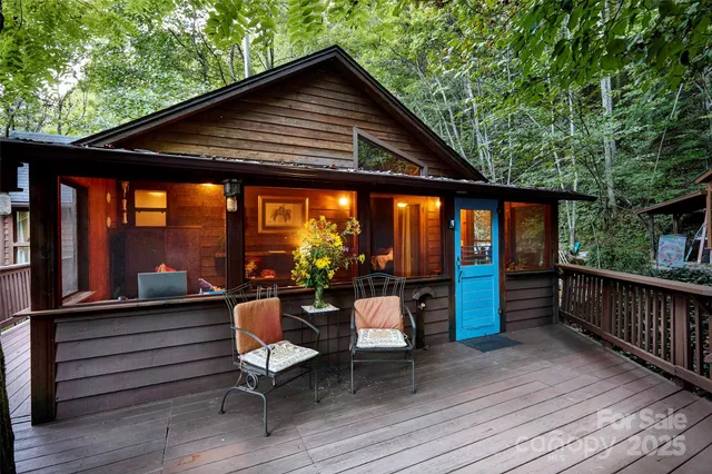 a view of kitchen island with furniture and wooden floor