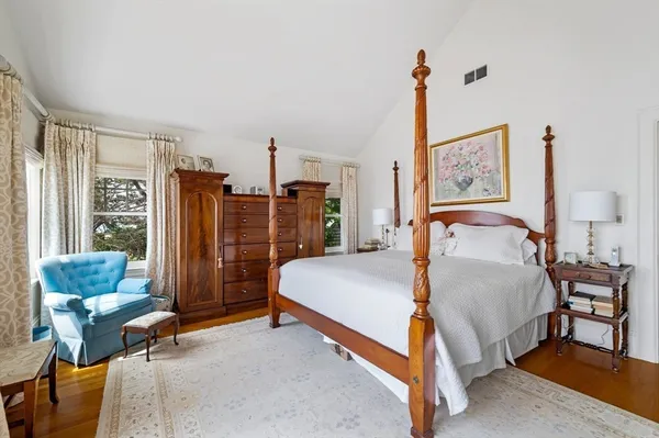 a bed room with a bed and a couch