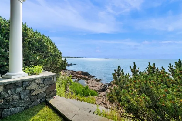 a view of a building with a yard