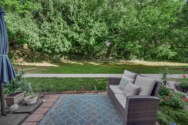a view of a bench in the garden