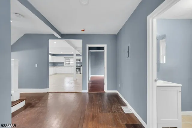 a view of livingroom with wooden floor