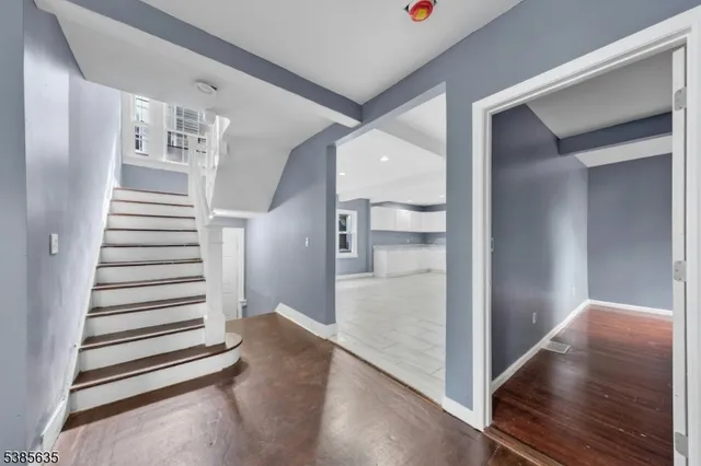 a view of a hallway view with staircase