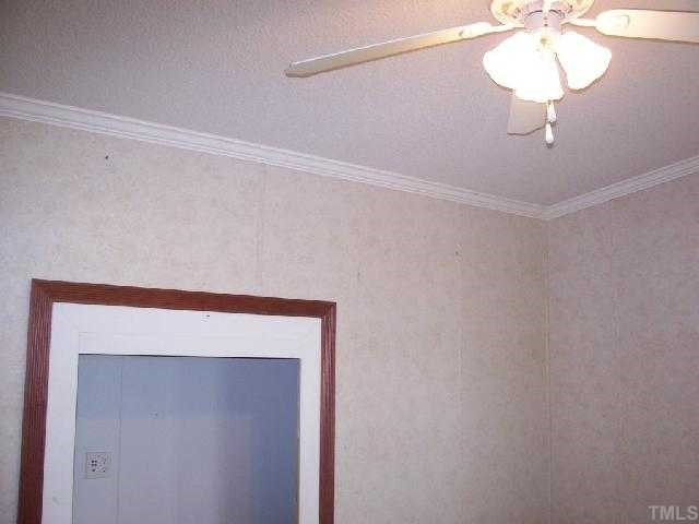 730 Creech Johnson Road Zebulon, NC 27597 - Photo 12 of 12 Recessed area in the den/family room for TV or entertainment system. Den/Family/Great Room