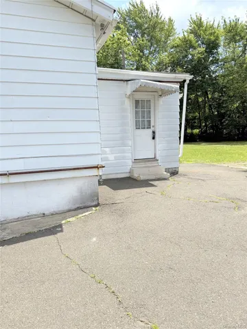 a view of backyard of house