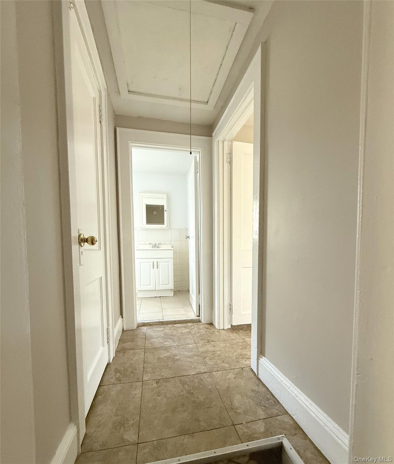 135 Ramapo Road Garnerville, NY 10923 - Photo 9 of 15 a view of a hallway with a wooden door