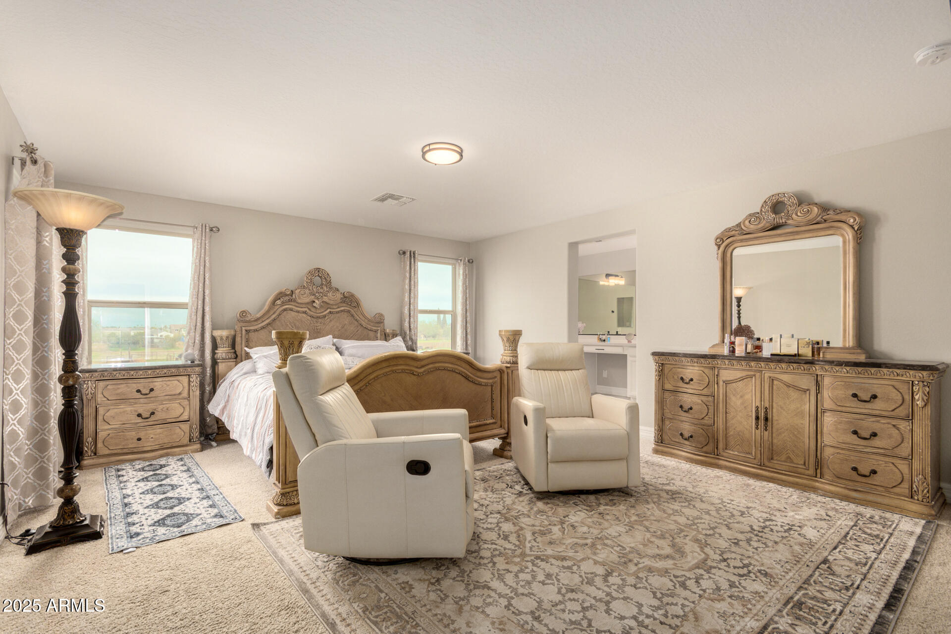 5126 West Roundhouse Road Laveen, AZ 85339 - Photo 19 of 39 a living room with furniture and a dresser with wooden floor