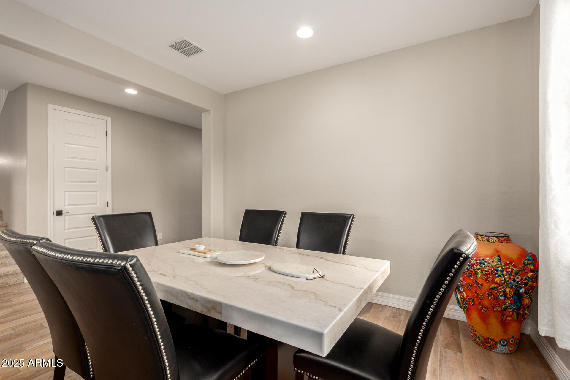 5126 West Roundhouse Road Laveen, AZ 85339 - Photo 9 of 39 a view of a dining room with furniture