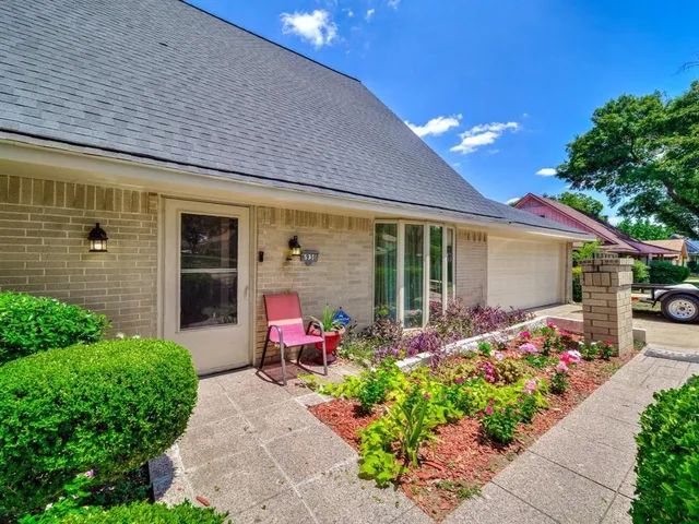 a front view of a house with an outdoor space