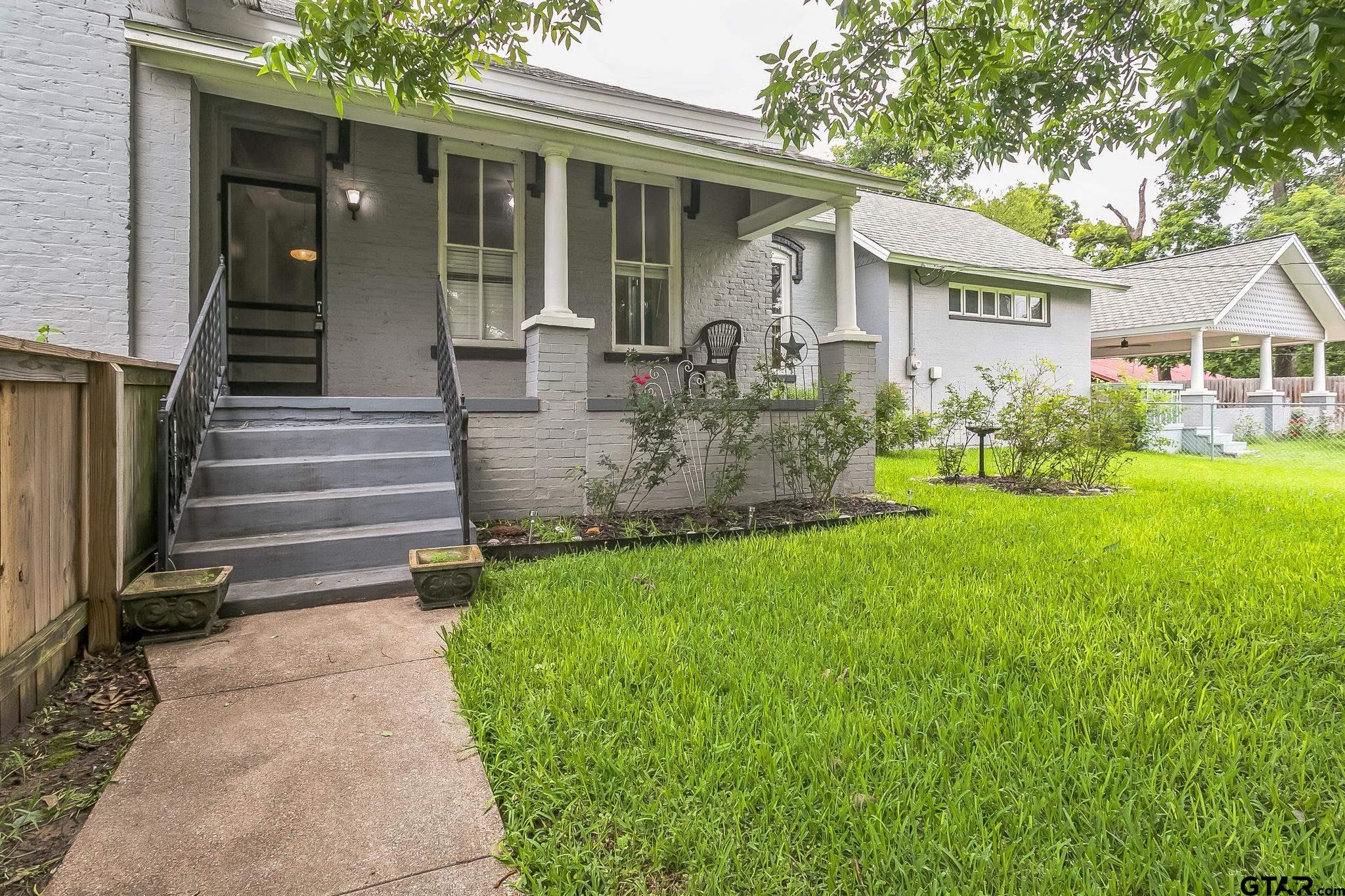 293 South Barron Rusk, TX 75785 - Photo 12 of 30 a view of a house with backyard and garden