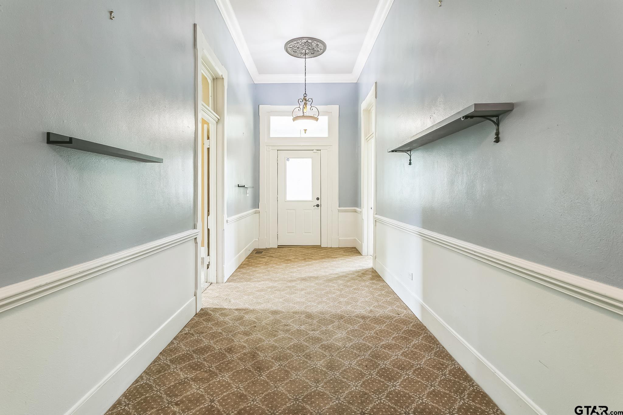 293 South Barron Rusk, TX 75785 - Photo 16 of 30 a view of a hallway with wooden floor and staircase