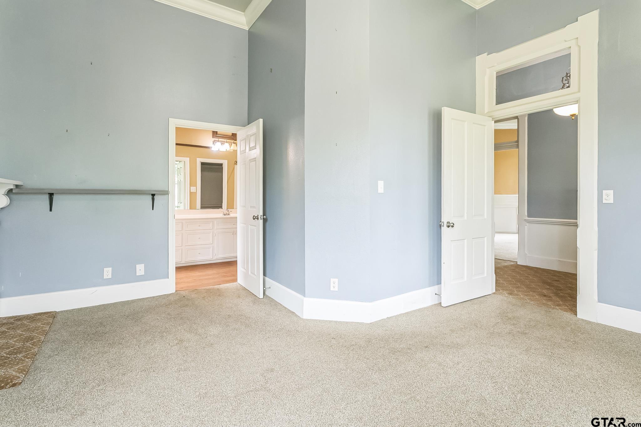 293 South Barron Rusk, TX 75785 - Photo 17 of 30 an empty room with windows and bathroom view