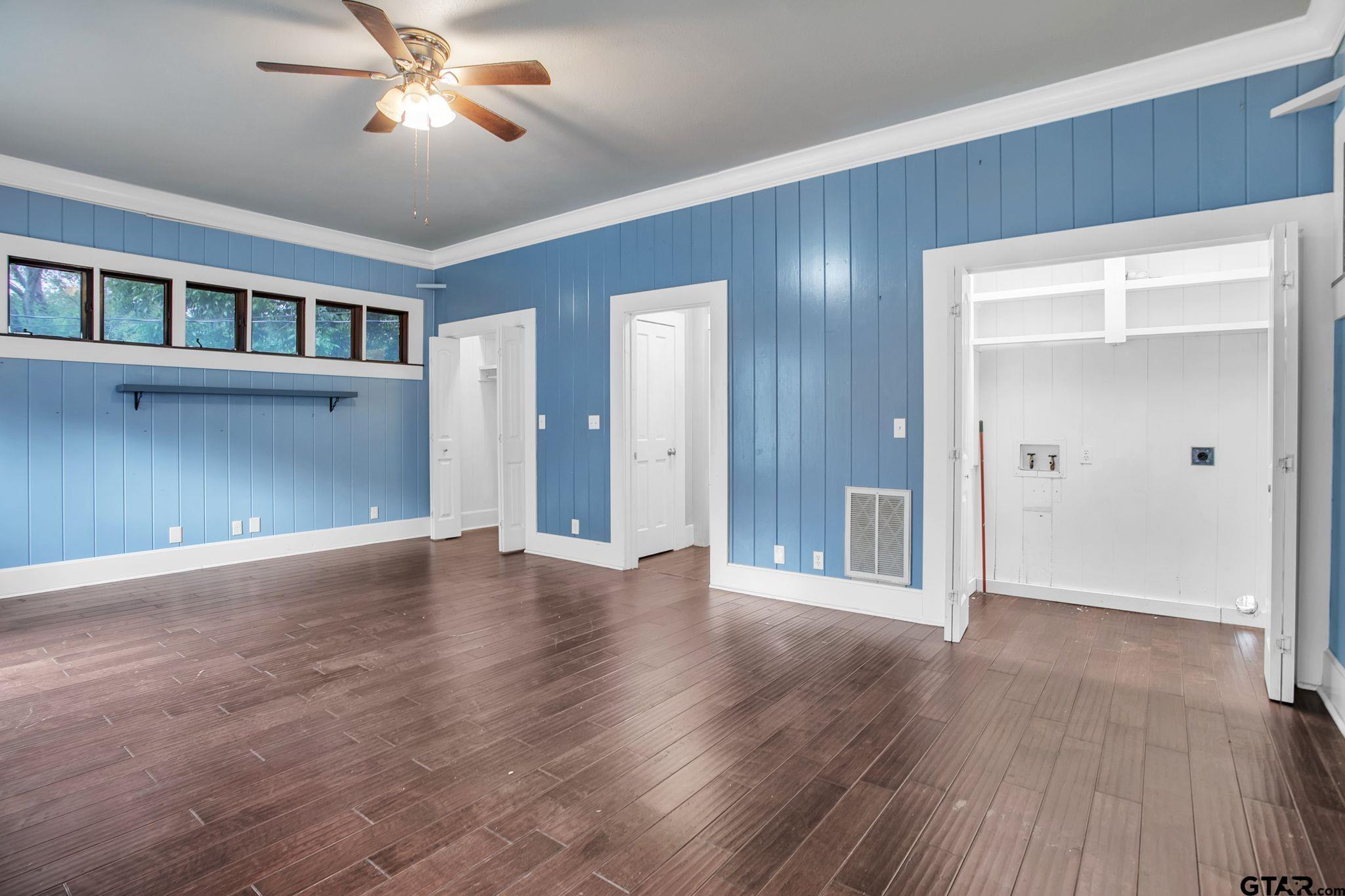 293 South Barron Rusk, TX 75785 - Photo 18 of 30 a view of an empty room with wooden floor