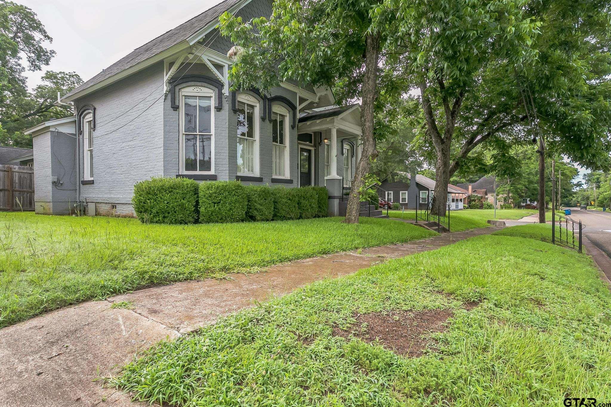 293 South Barron Rusk, TX 75785 - Photo 3 of 30 a front view of a house with a yard