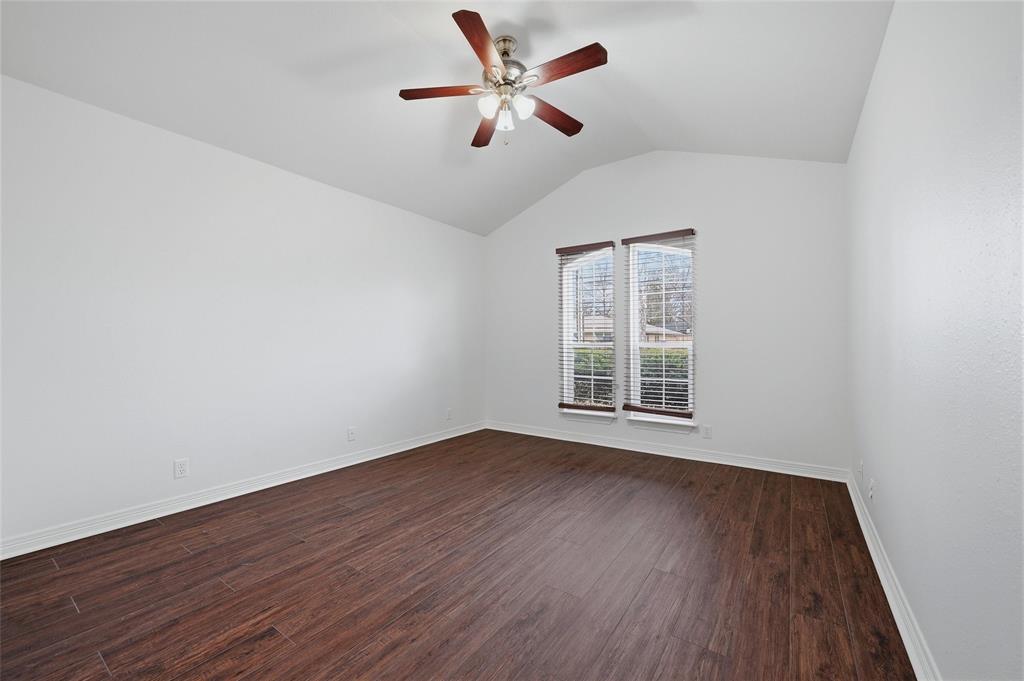 2418 Loy Lake Road Denison, TX 75020 - Photo 14 of 23 wooden floor in an empty room with a window