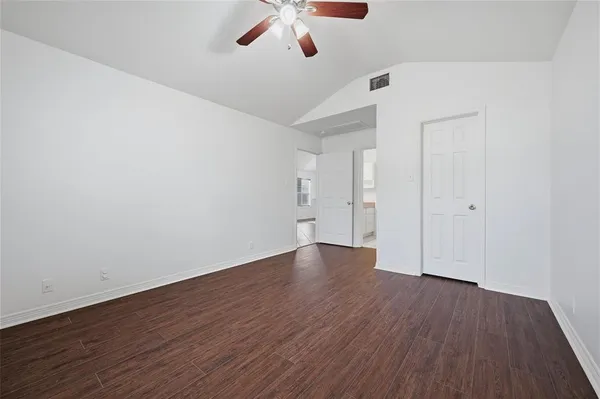 a bathroom with a sink vanity granite and a mirror