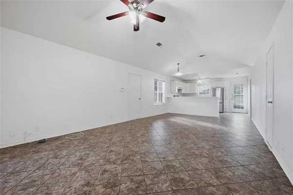 a view of a kitchen with a sink and cabinets