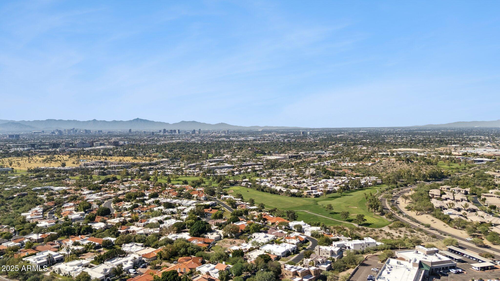 6314 North 33rd Street, Unit 2 Paradise Valley, AZ 85253 - Photo 12 of 16 an aerial view of residential building and trees around
