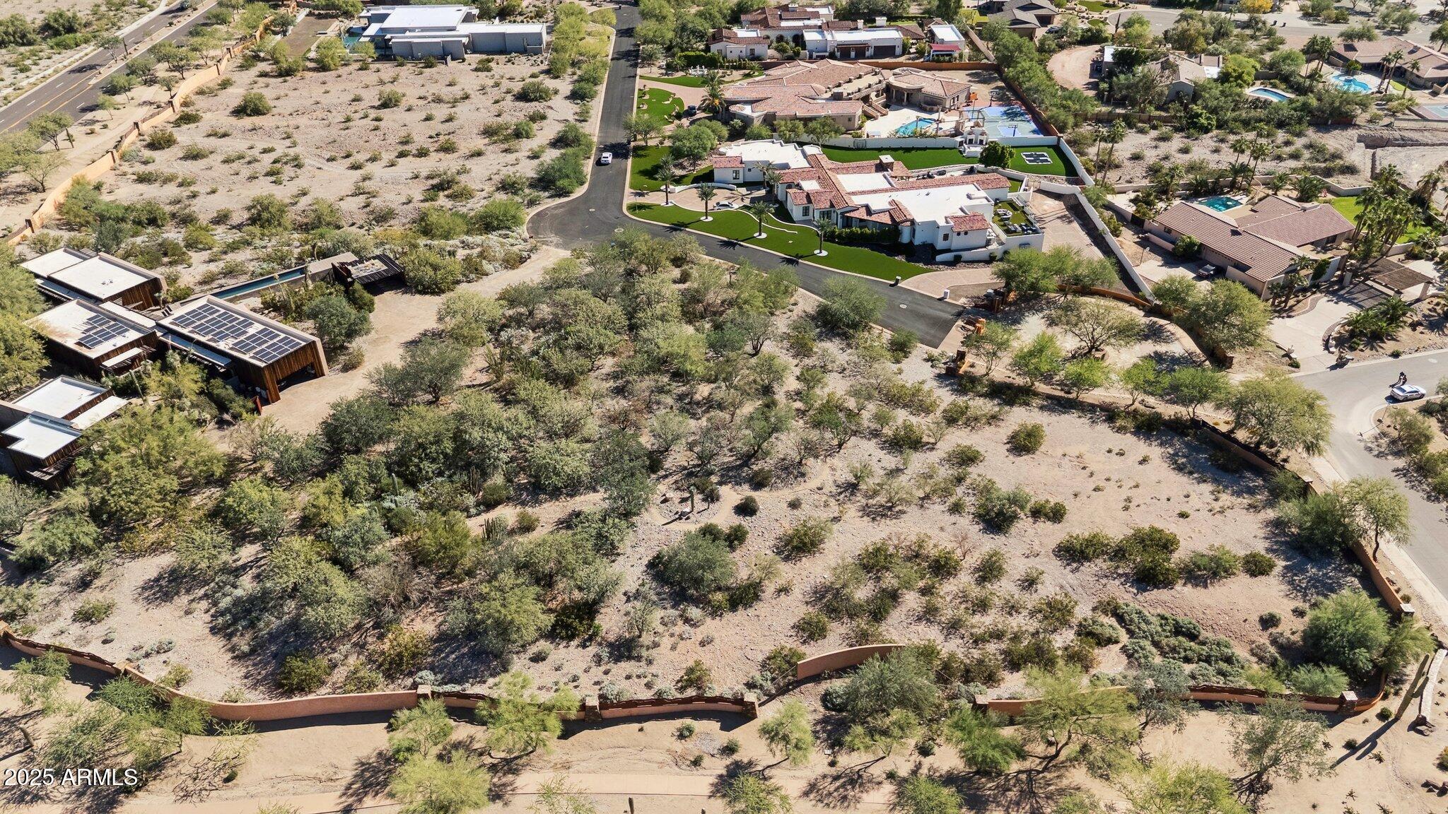 6314 North 33rd Street, Unit 2 Paradise Valley, AZ 85253 - Photo 7 of 16 an aerial view of residential houses with outdoor space