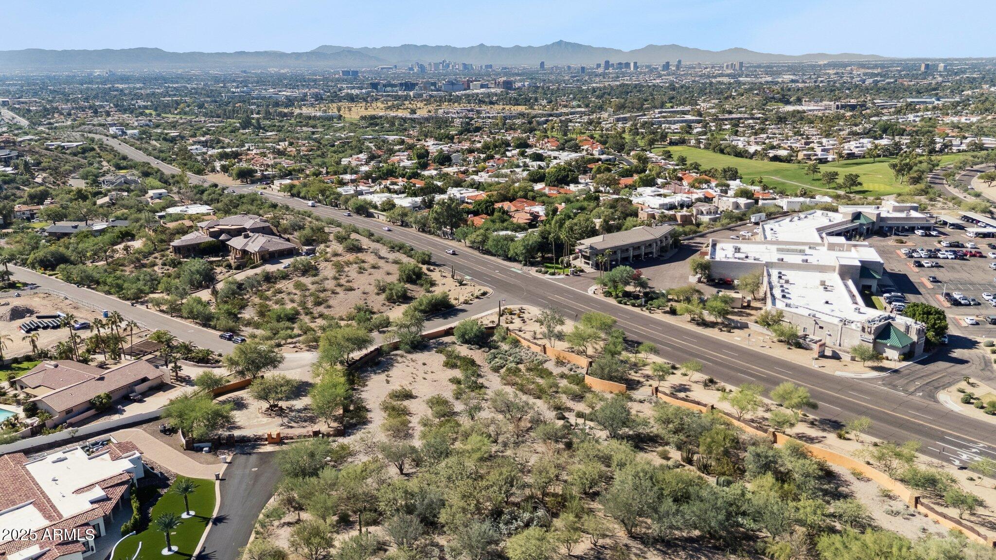 6314 North 33rd Street, Unit 2 Paradise Valley, AZ 85253 - Photo 9 of 16 an aerial view of residential houses with outdoor space