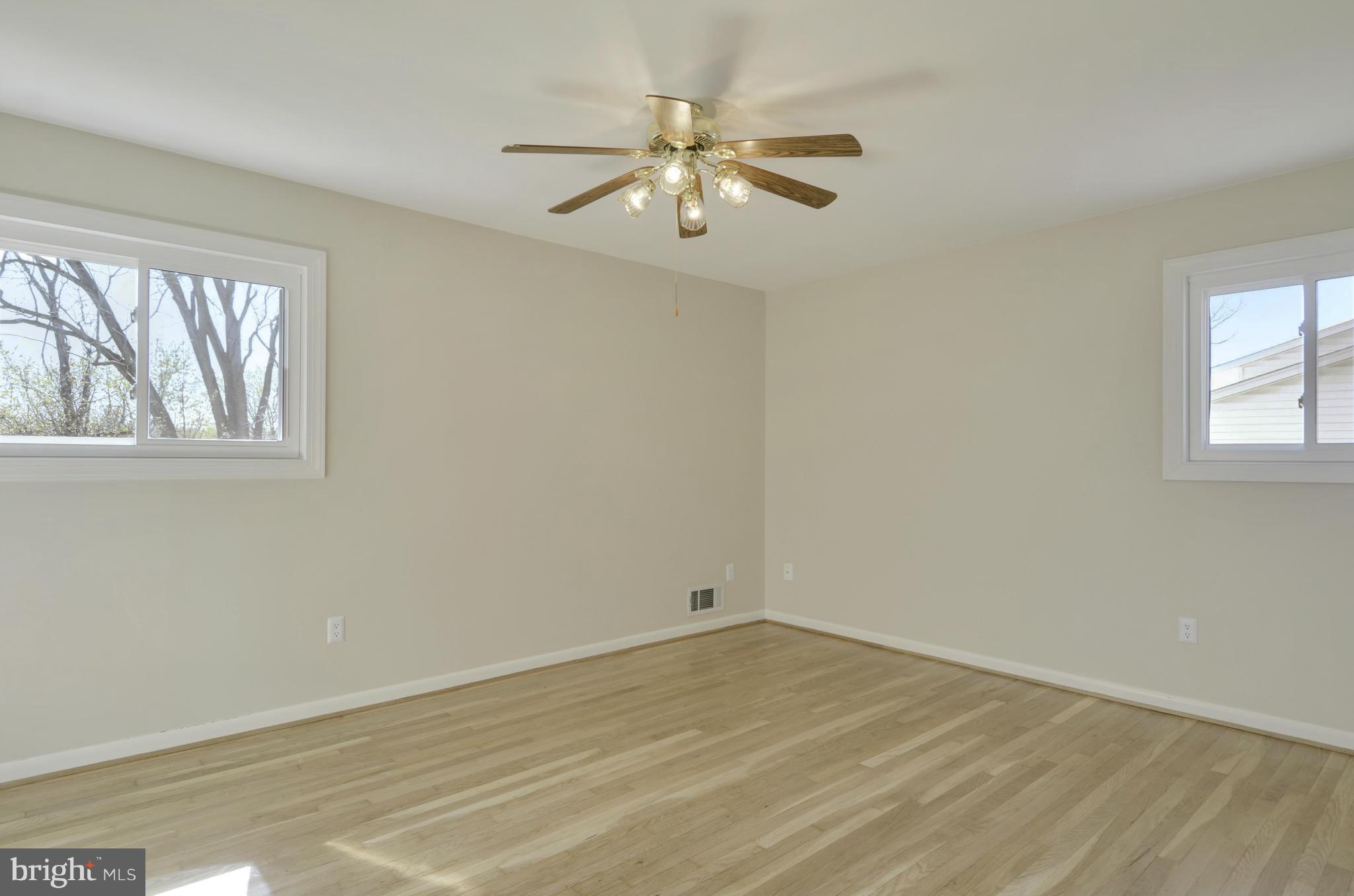 5404 Manorfield Road Rockville, MD 20853 - Photo 17 of 30 Spacious MBR w/refinished hardwood floor