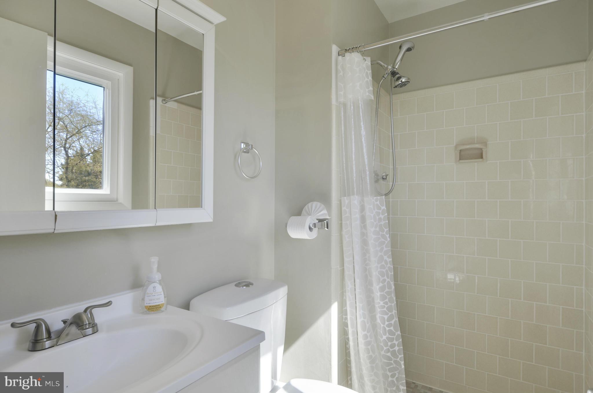 5404 Manorfield Road Rockville, MD 20853 - Photo 19 of 30 Updated, sparkling en suite ceramic MBR Bath